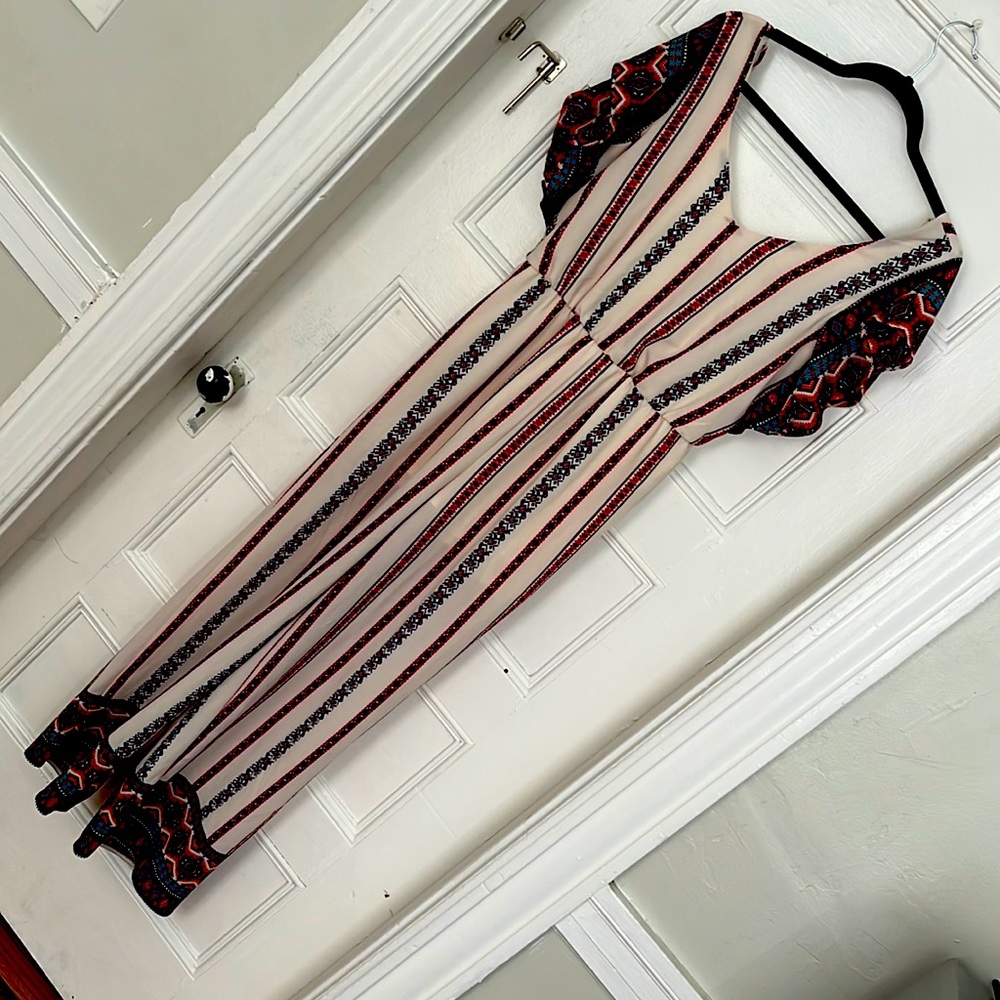 Romper. Size medium. Good quality material, has a stretch to it.